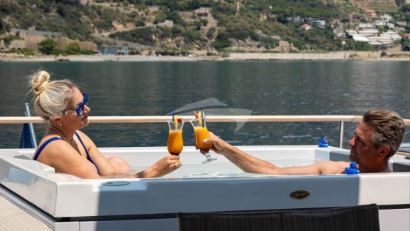 Cheers in the jacuzzi