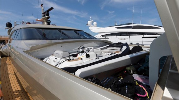 Open garage with tender