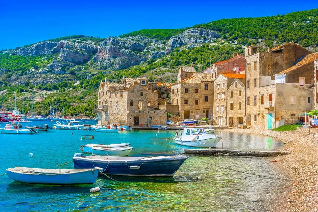 Small boats moored at beach in Vis, Croatia