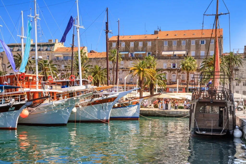 View of the promenade the Old Town of Split with the Palace of Diocletian and the marina, the Adriatic coast of Croatia.