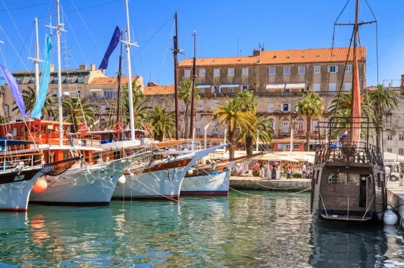 View of the promenade the Old Town of Split with the Palace of Diocletian and the marina, the Adriatic coast of Croatia.