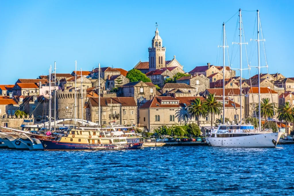 Seafront view at beautiful Korcula town in summertime, a tourist place in Southern Croatia.