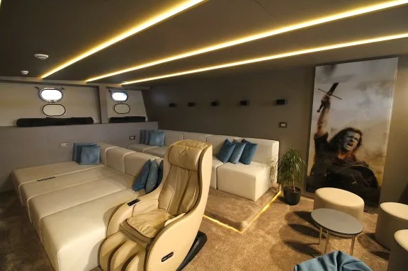 Luxury Motor Yacht (Mini Cruise Ship) Freedom: Cinema Room with Brave Heart Wall Picture