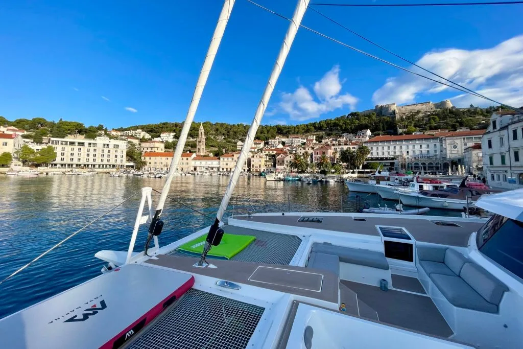 Catamaran FLOREMYE docked in Hvar in the morning light