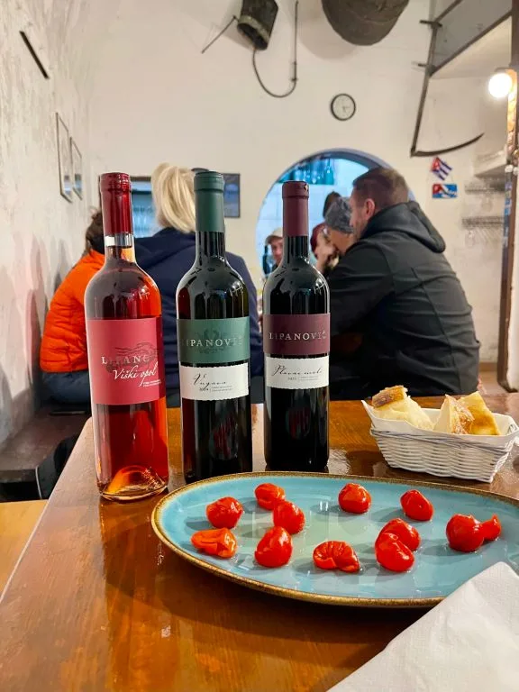 Guest enjoy wine tasting in the war bunkers on Vis Island, Croatia