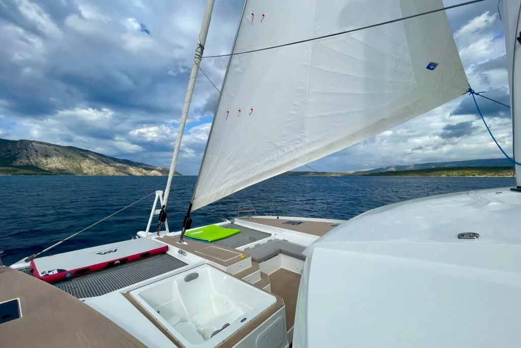 Catamaran FLORAMYE under sail in the Adriatic off Croatia, sails full on a sunny day