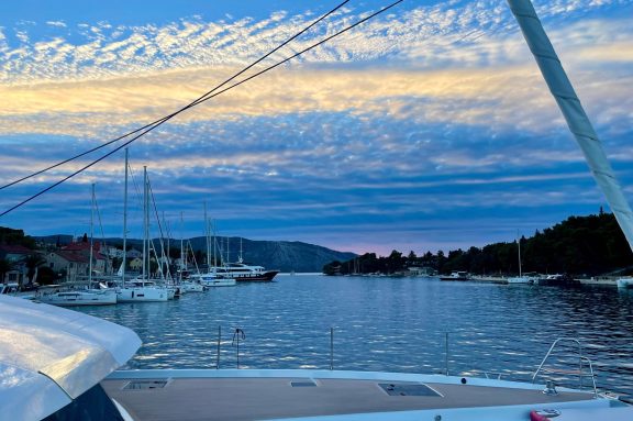 Sunset onboard catamaran FLORAMYE docked in Stari Grad, Croatia