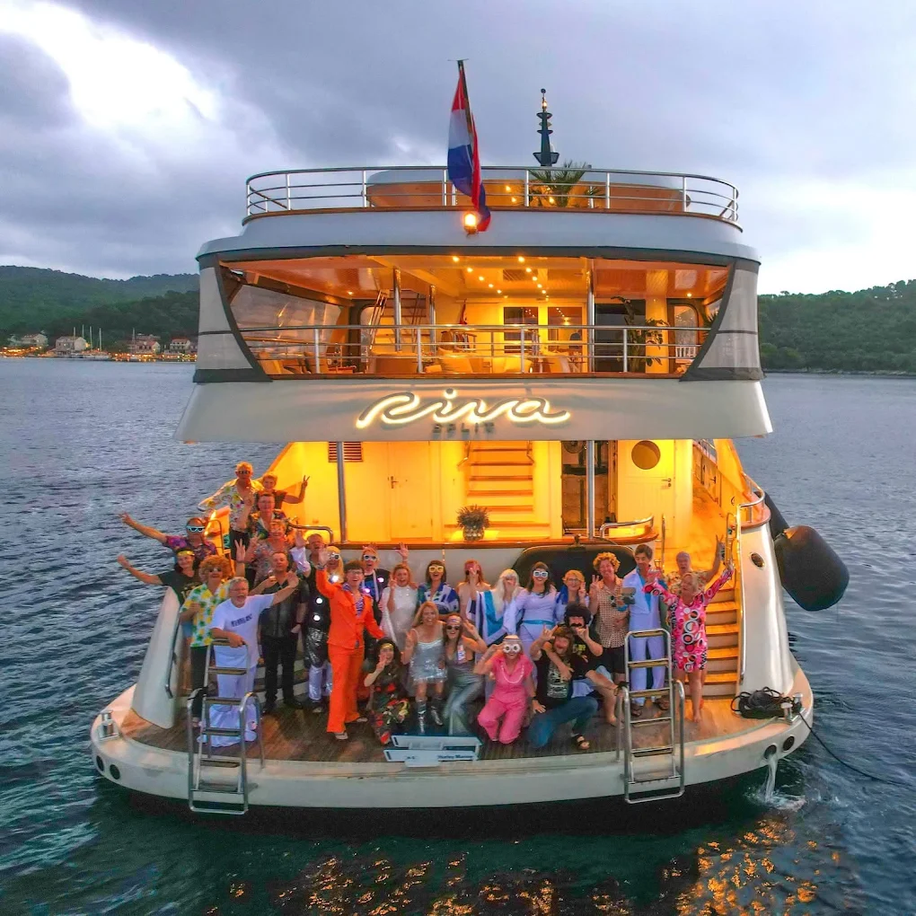 Clients posing on the back deck og superyacht RIVA in Croatia