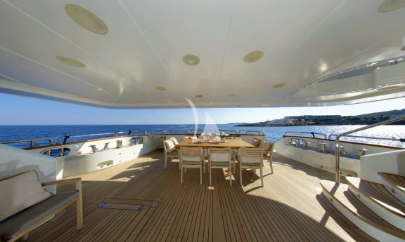 Main Aft Deck - The dining table can be extended to sit 12 guests