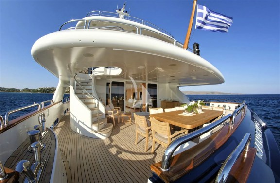 Main Aft Deck - The dining table can be extended to sit 12 guests