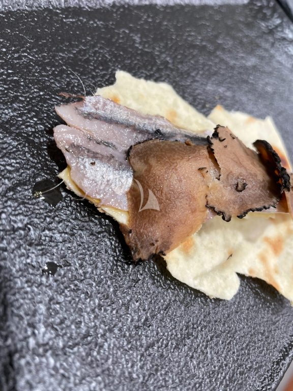 Thousand-layered Pane Carasau with Whipped Cod and Olive Powder