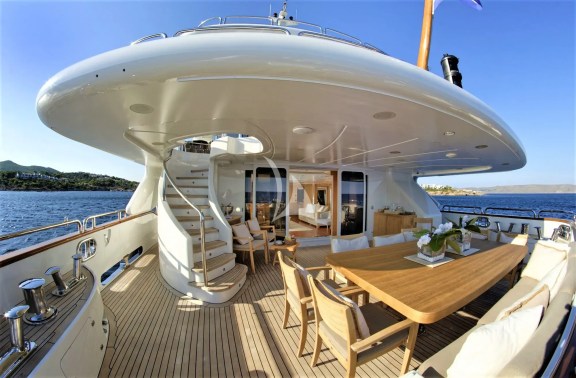 Main Aft Deck - The dining table can be extended to sit 12 guests