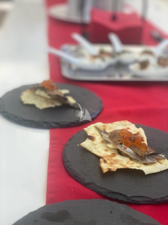 Thousand-layered Pane Carasau with Whipped Cod and Olive Powder