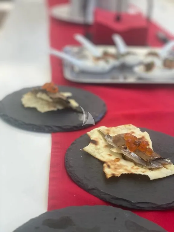 Thousand-layered Pane Carasau with Whipped Cod and Olive Powder