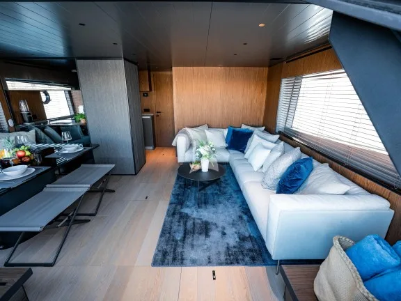 Salon with dining area and galley