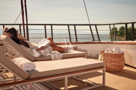 Relaxing on a sundeck.