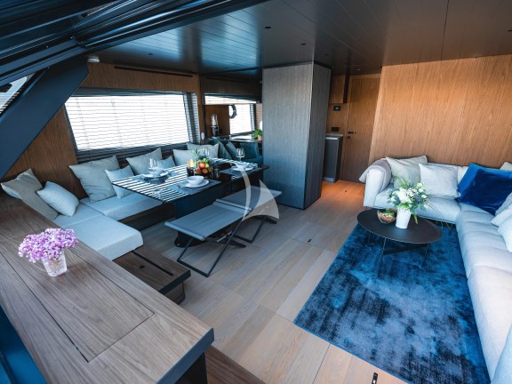 Salon with sitting/dining area and galley