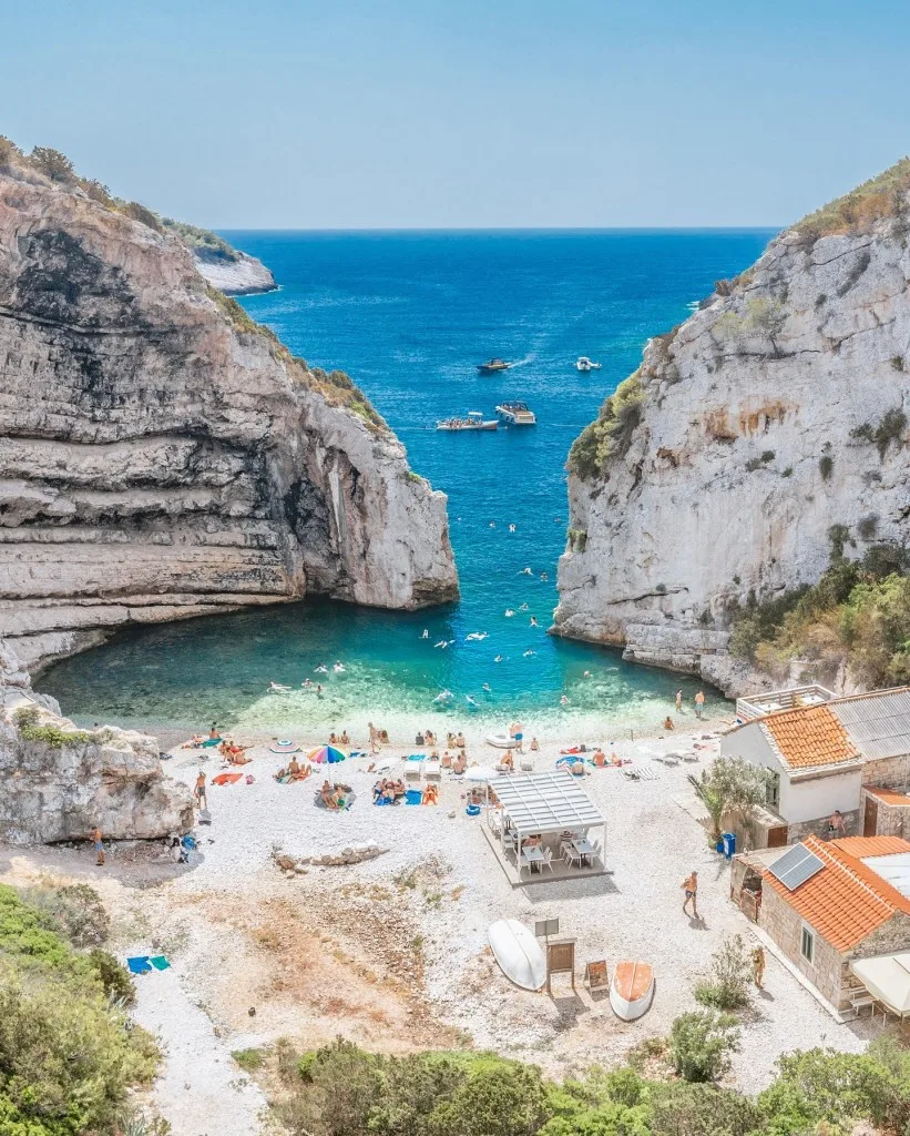 Stiniva beach between limestone cliffs on Vis