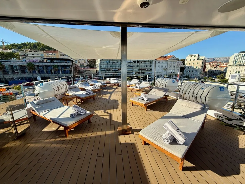 Rows of sunbeds under the shade on the sun deck of motor yacht ARGO, Split, September 2026.