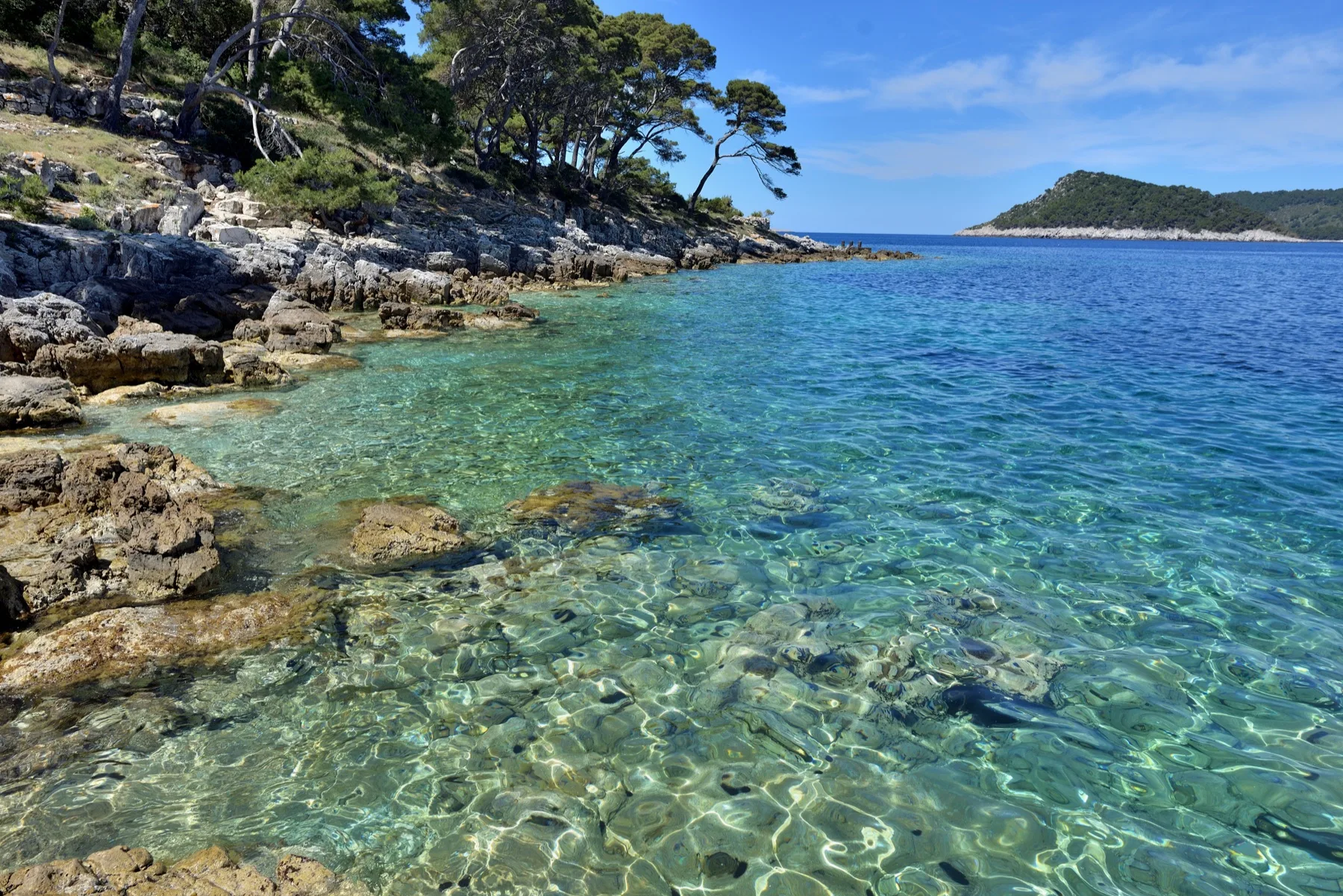 Clear water over a rocky shore on Lastovo island