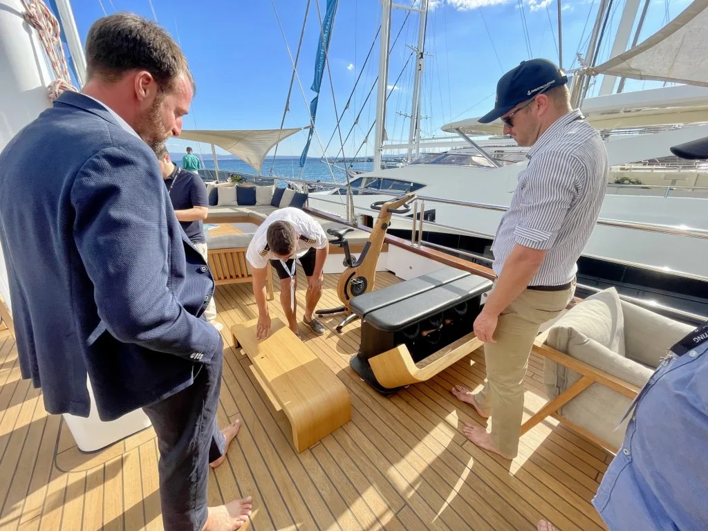 Two DMA brokers being shown the gym gear on MARALLURE's sundeck