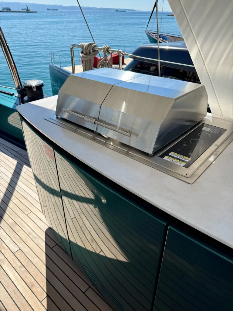 The stainless barbecue and smoker unit on the flybridge of catamaran MIDORI, September 2026.