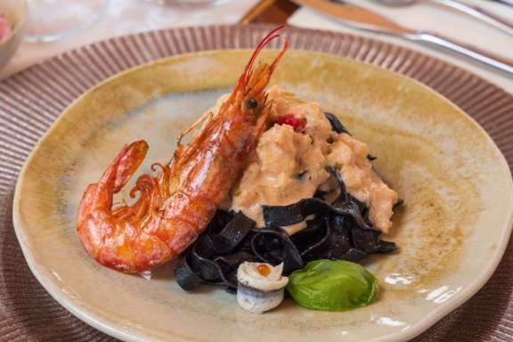 Black squid pasta with prawns